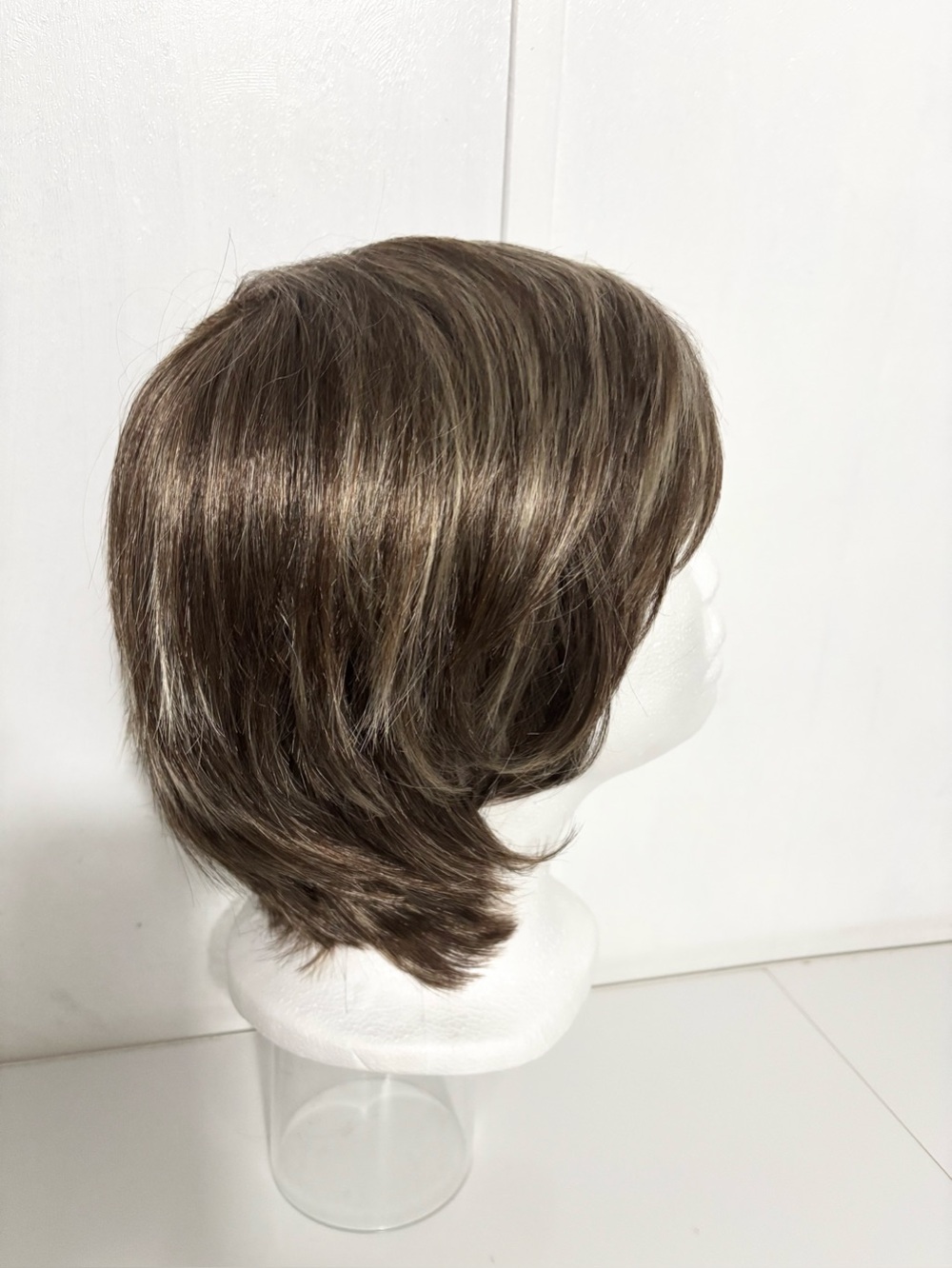Woman’s Short And Layered Brown And Highlighted Synthetic Wig Natural Look